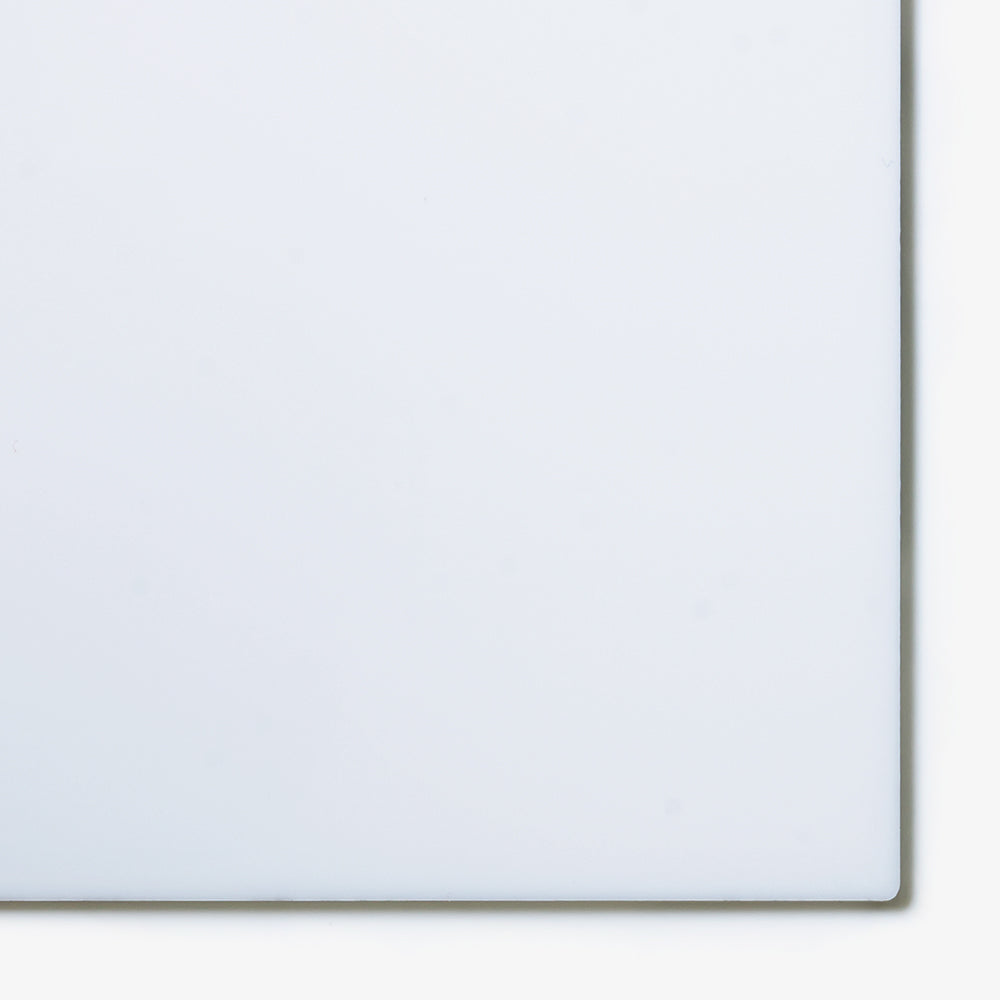 P95 7328 matte white cast acrylic sheet sample with penny for scale