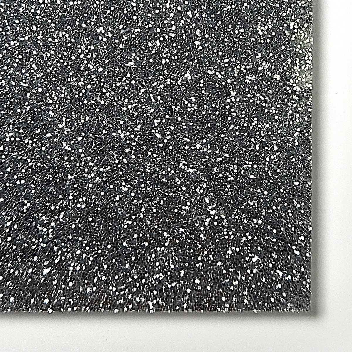 Black and silver glitter cast acrylic sheet swatch