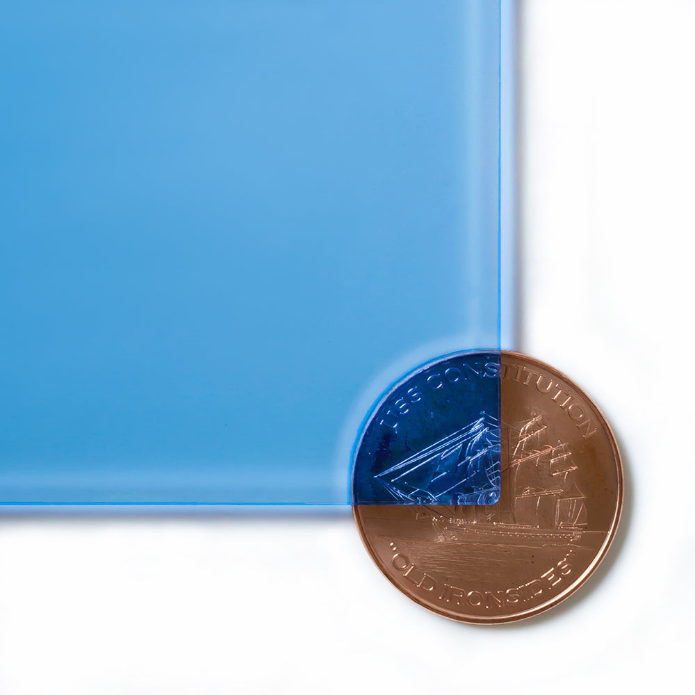 2069 Blue transparent cast acrylic sheet sample with penny for scale