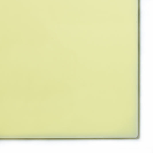 2146 Ivory translucent cast acrylic sheet sample with penny for scale
