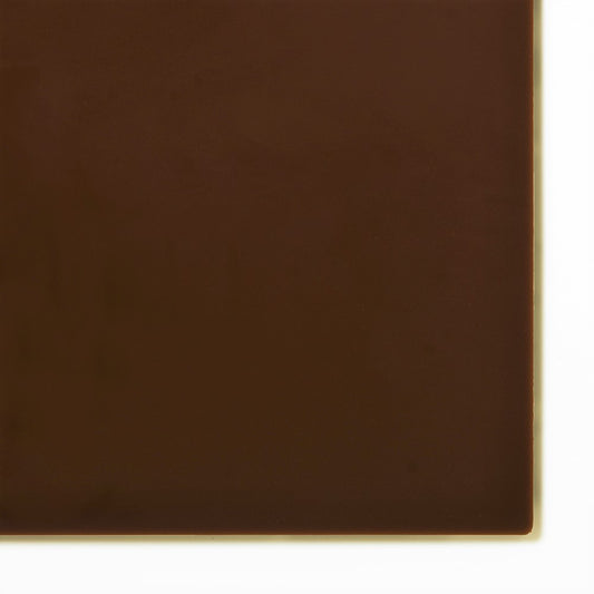 2418 Brown opaque cast acrylic sheet sample with penny for scale