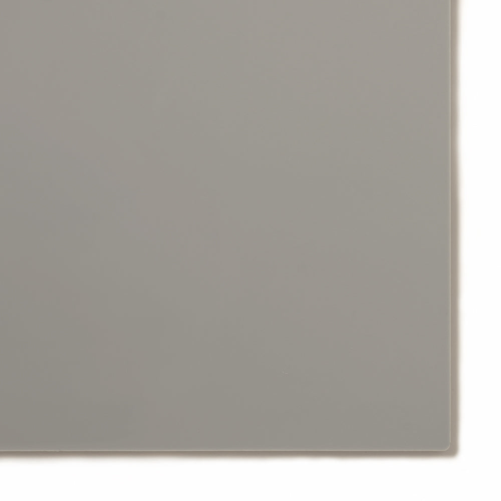 504 Gray opaque cast acrylic sheet sample with penny for scale